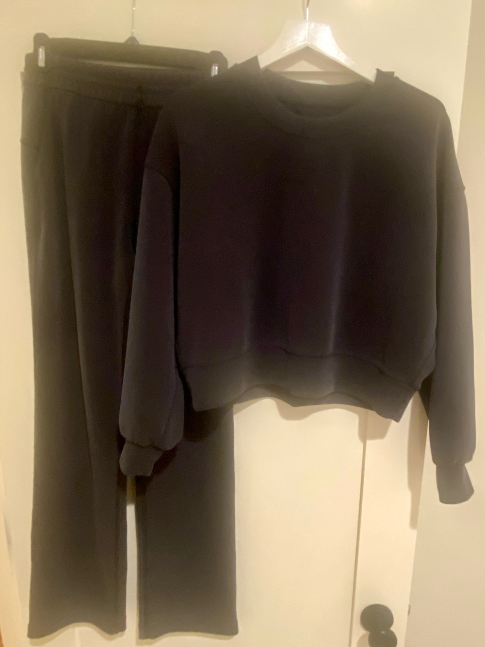Lululemon SET.  Dark blue cropped top and bottom.  Size 4.